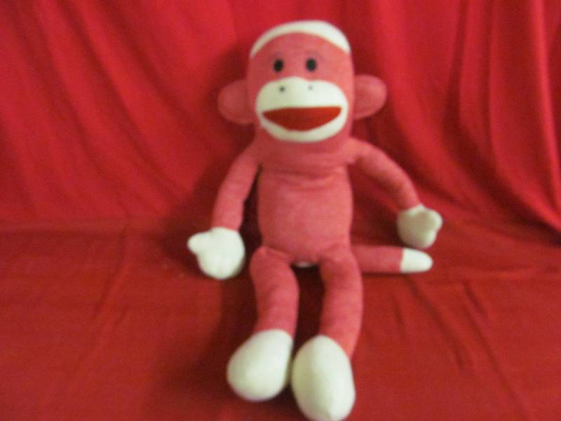 lot 102 image: Maxx the sock monkey