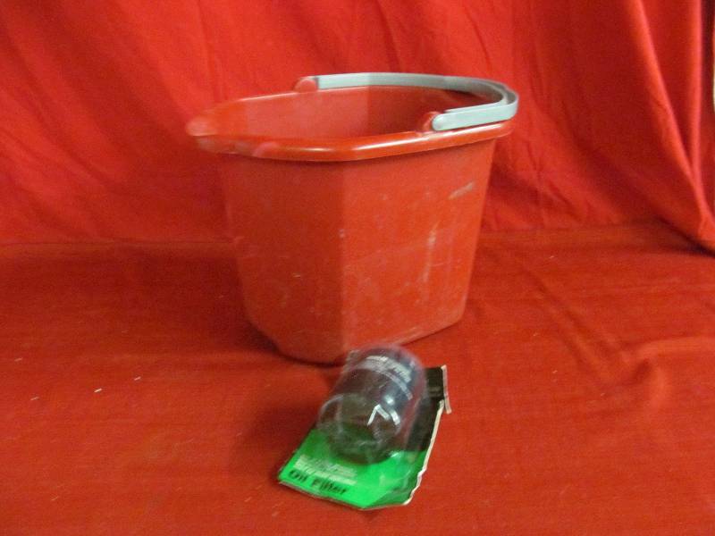 lot 180 image: wash bucket, oil filter