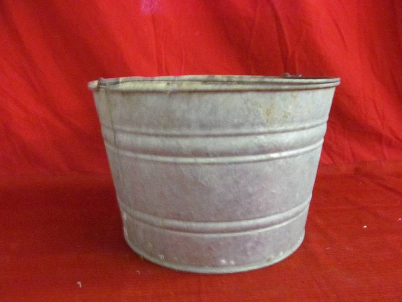 lot 193 image: old galvanized bucket