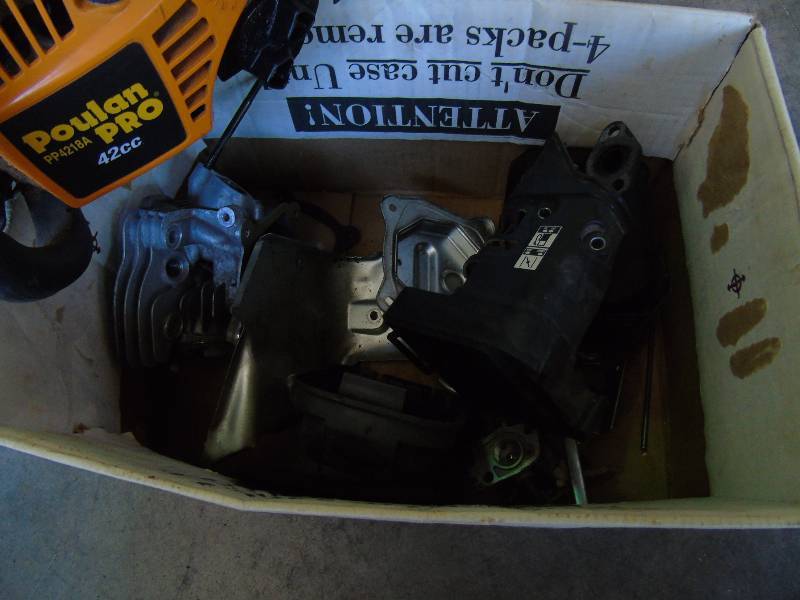 lot 51 image: Poulan Pro Chainsaw  18in. Bar, 42cc, 38in. Pitch, Model# PP4218A