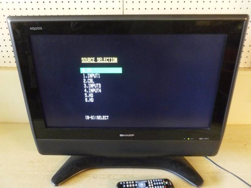 lot 1 image: Sharp Flat Screen T.V