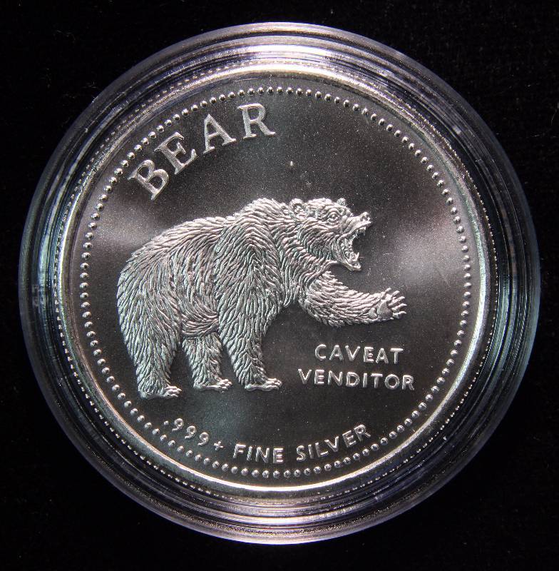 1 TROY OZ. .999 FINE SILVER BULLS & BEARS IN AIRTITE HOLDER