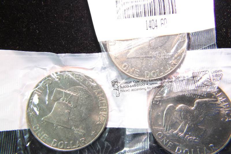 GROUP OF 3 EISENHOWER CLAD DOLLARS SEALED