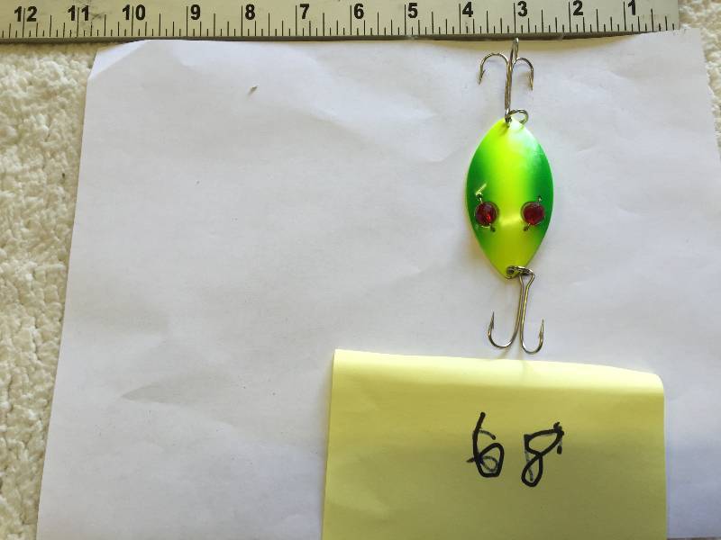 lot 68 image: medum green 4 yellow spoon with 2 red ruby lure