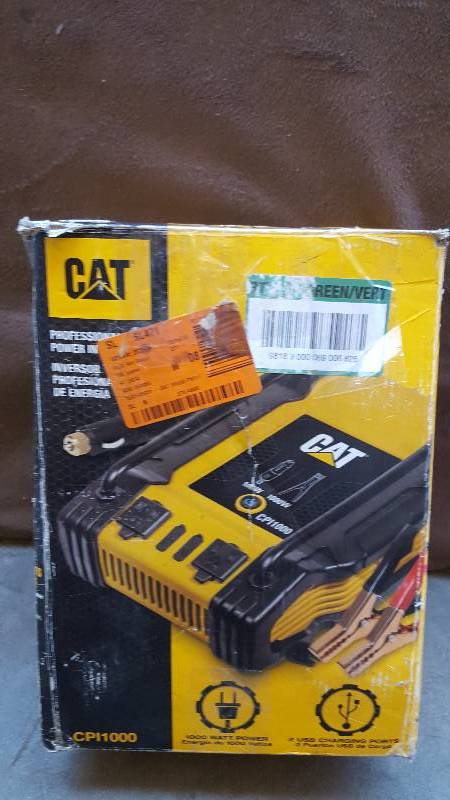 lot 26 image: CAT 1000-Watt Power Inverter  Model # CPI1000