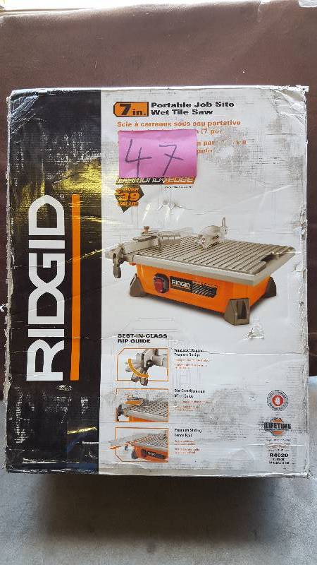 lot 47 image: Ridgid 7 in. Job Site Wet Tile Saw Model # R4020 new