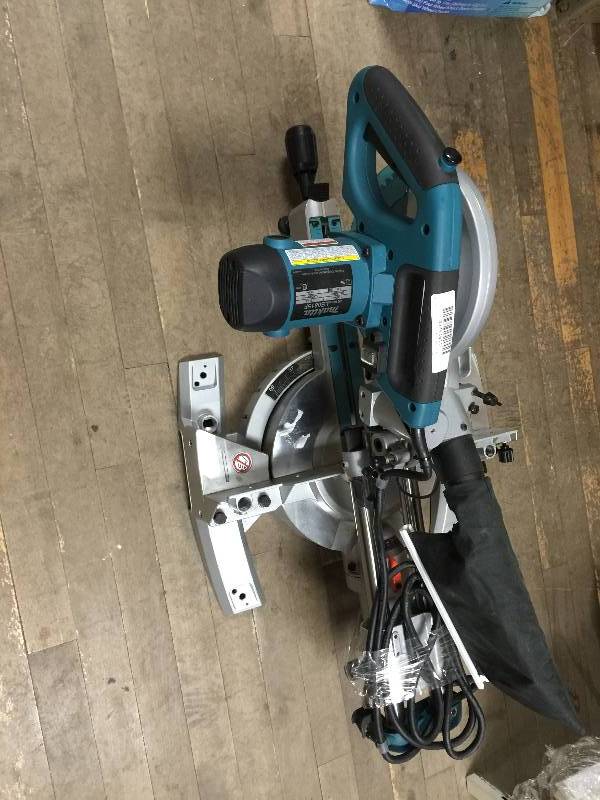 lot 49 image: Makita 10.5 Amp 8-12 in. Slide Compound Miter Saw