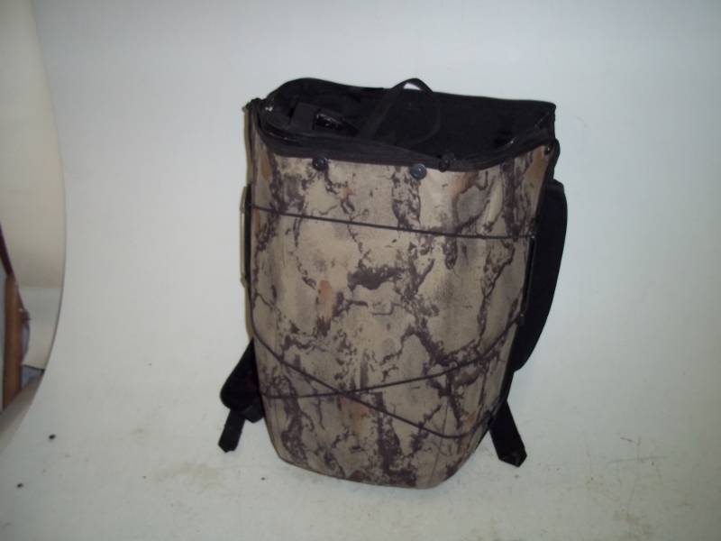 lot 22 image: Hard case camouflage backpack