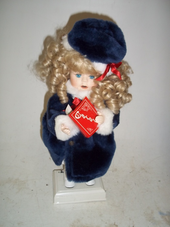 lot 27 image: Musical Doll