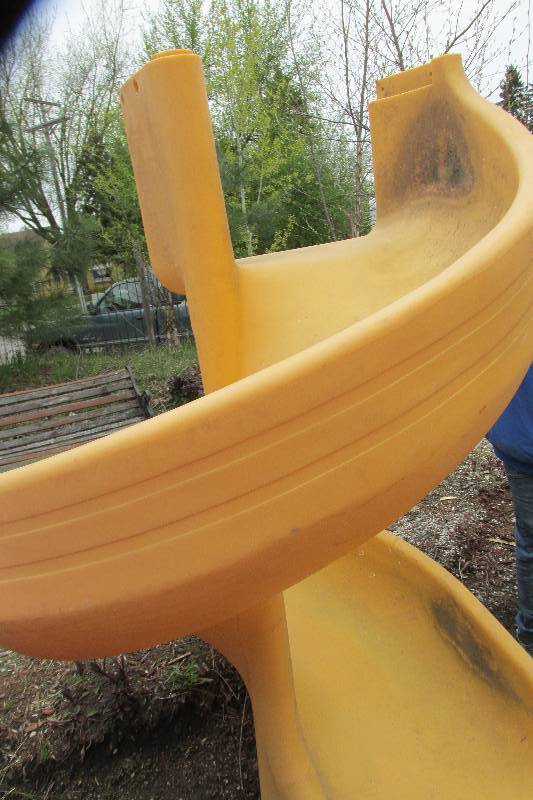 Large spiral slide with metal suppo...
