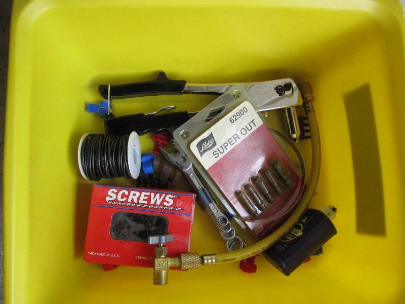 yellow bin with tools inside...