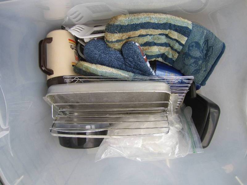 bin of kitchen supplies...