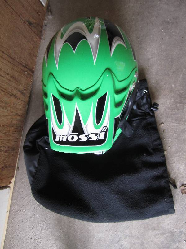 green motor cycle helmet...