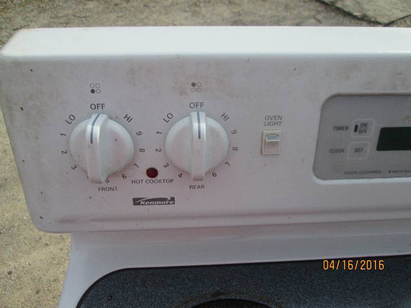 Kenmore stove with glass top cookin...