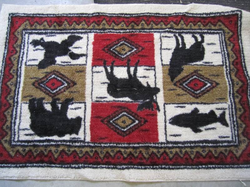Rug 44 x 3o with animal patterns...