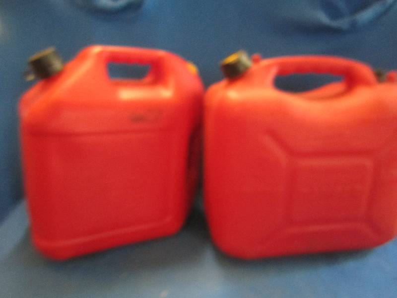 2 5 gallon gas cans...