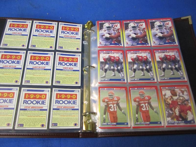 Album filled with sports cards, see...