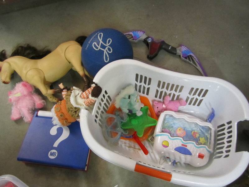 Laundry basket filled with toys...