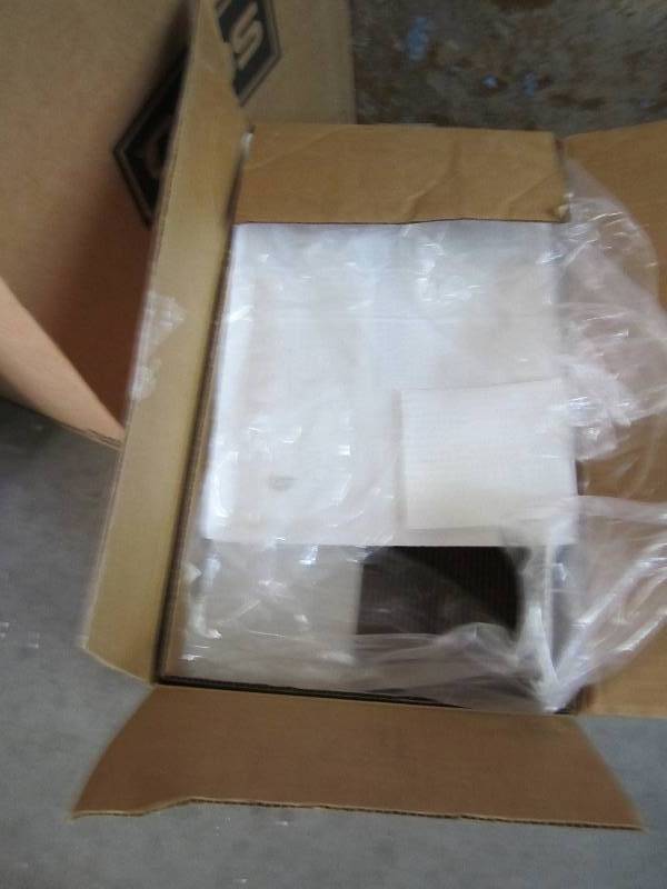 Open box nearly full of chocolate w...