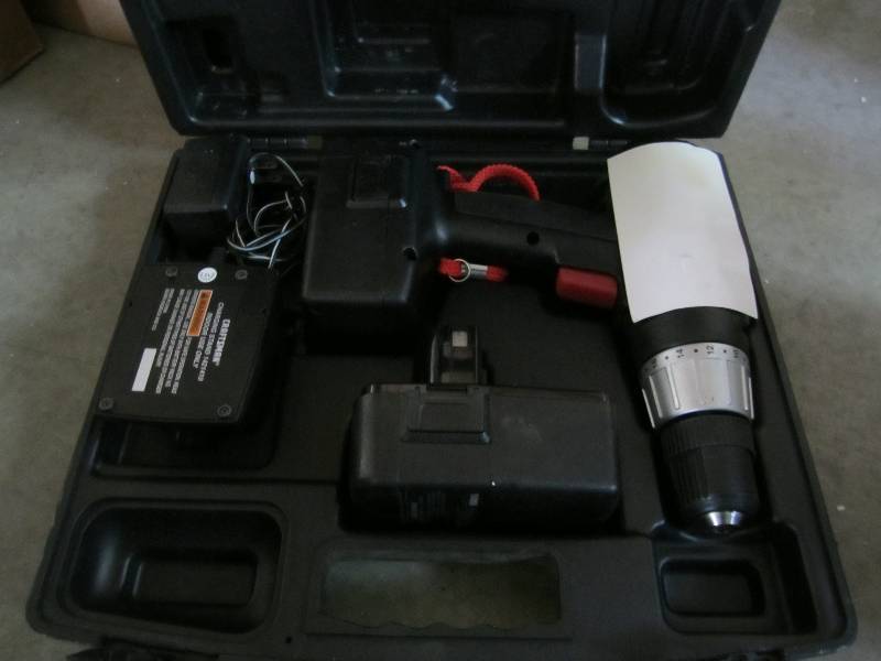 Battery operated drill with battery...