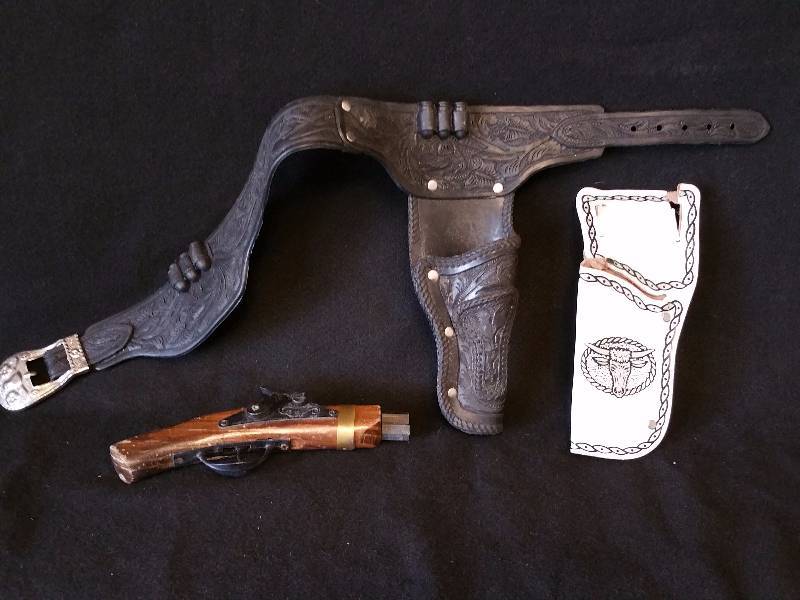lot 38 image: Cap Gun Holsters and Flintlock Pistol