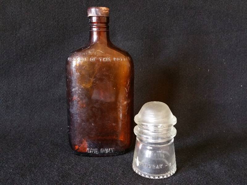 lot 88 image: Antique Brown Medicine Bottle & Insulator
