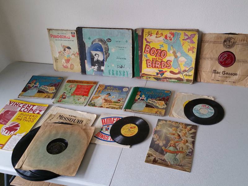 lot 231 image: Vintage Pinocchio Book, Bozo and the Birds Records, Etc.