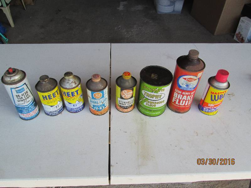 lot 162 image: Old Automotive Cans