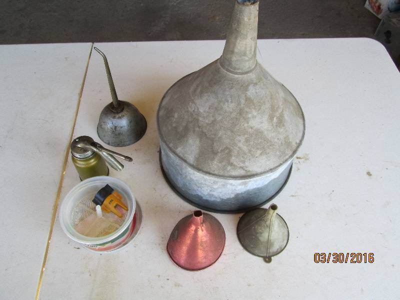 lot 176 image: Funnels & Oil Cans