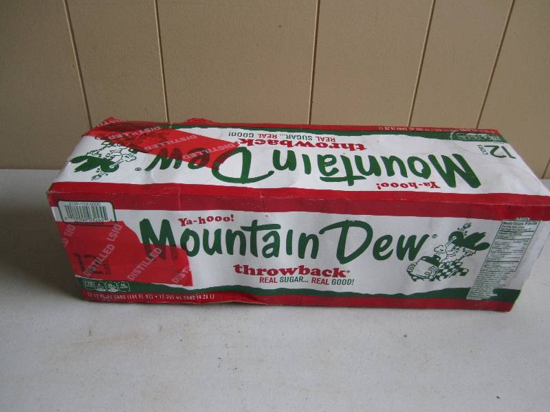 12 pack of pop  soda cans, package...
