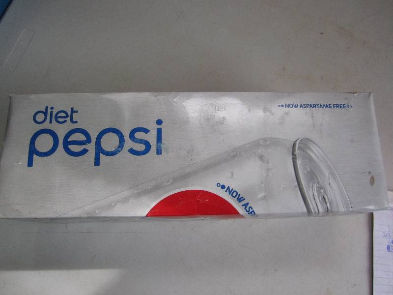 12 pack of pop  soda cans, package...