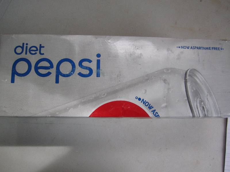 12 pack of pop  soda cans, package...