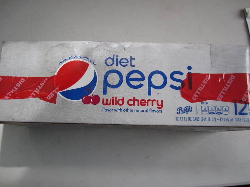 12 pack of pop  soda cans, package...