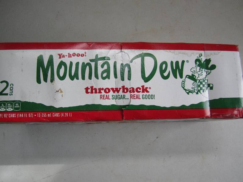 12 pack of pop  soda cans, package...
