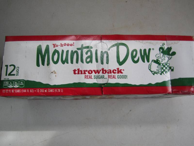 12 pack of pop  soda cans, package...
