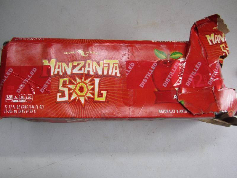 12 pack of pop  soda cans, package...