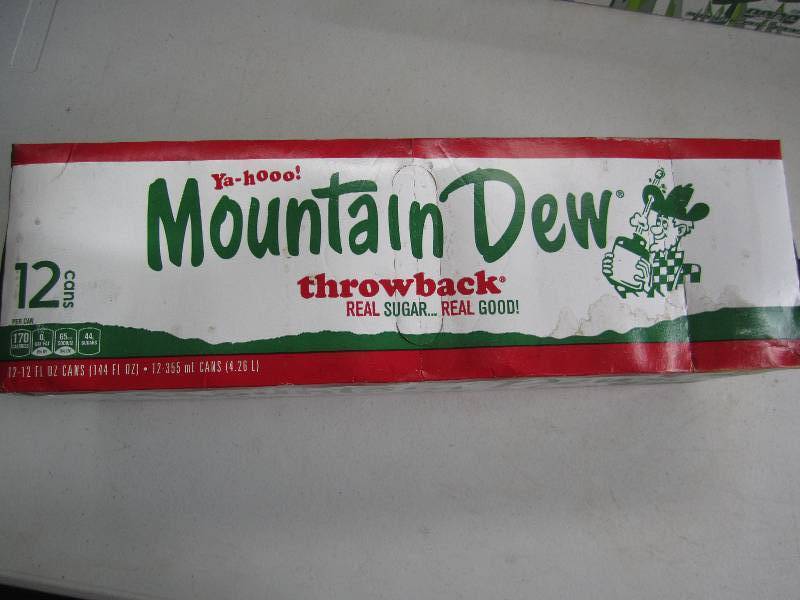 12 pack of pop  soda cans, package...