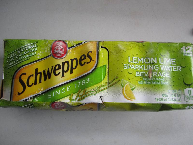 12 pack of pop  soda cans, package...