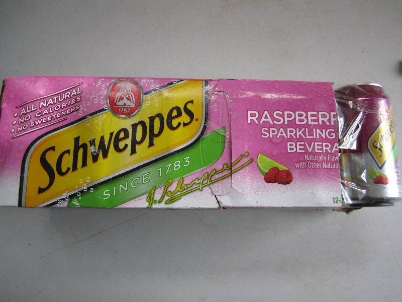12 pack of pop  soda cans, package...