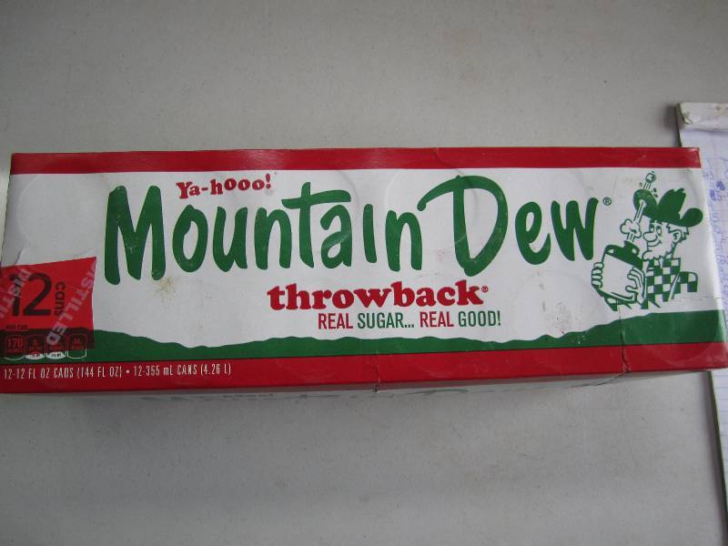 12 pack of pop  soda cans, package...