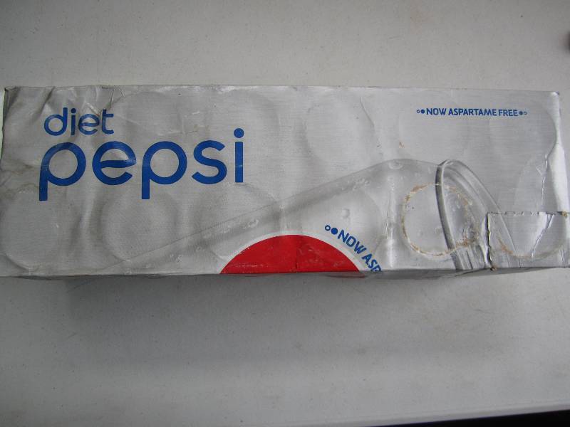 12 pack of pop  soda cans, package...