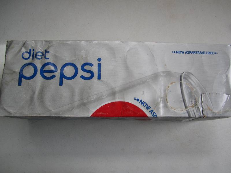 12 pack of pop  soda cans, package...