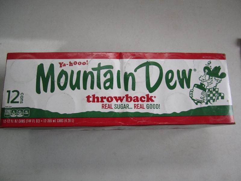 12 pack of pop  soda cans, package...