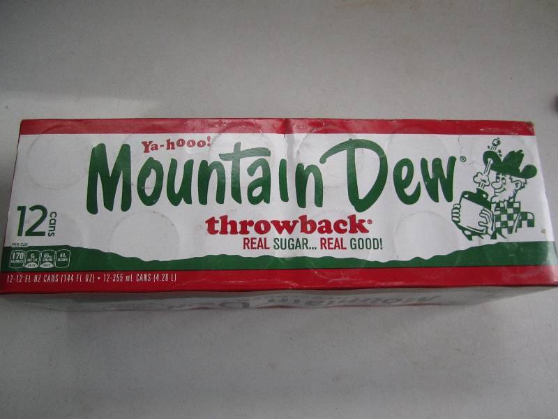 12 pack of pop  soda cans, package...