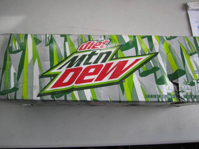 12 pack of pop  soda cans, package...