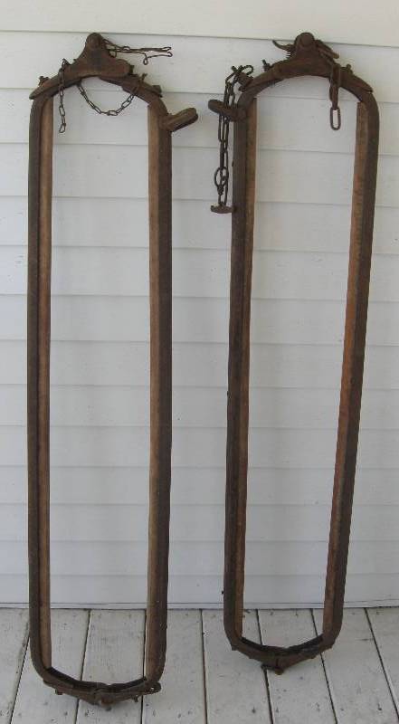 lot 40 image: 2 Vintage Wood & Cast iron Cattle Stanchions