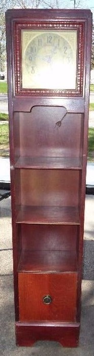 lot 29 image: Bookshelf with Electric Clock