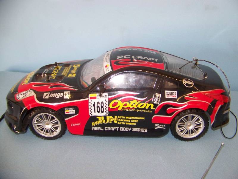 lot 71 image: RC Car and (2) Controllers