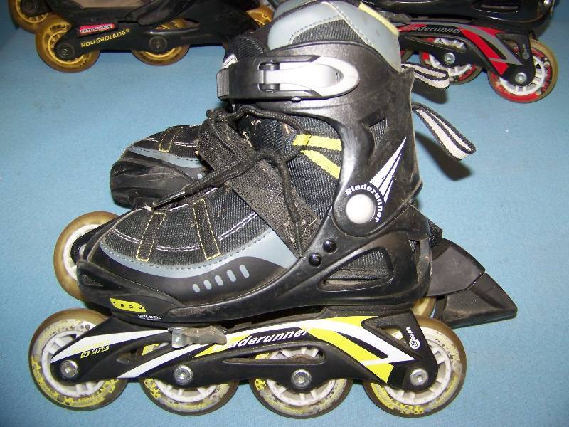 lot 31 image: (3 pair) Kids Inline Skates