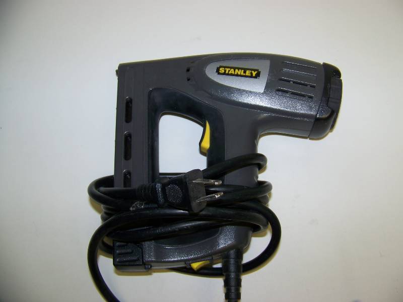 lot 76 image: Ryobi, Circular Saw, Dremel Tool and Electric Nailer  Stapler